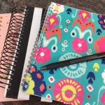 Photo of journals and pen